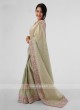 Shimmer Silk Border Work Saree In Pista Green Color